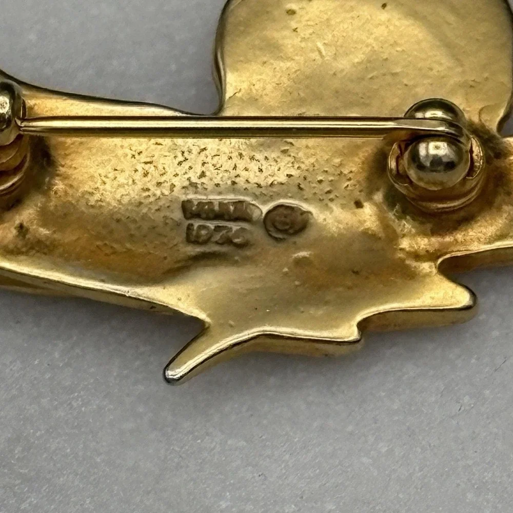 Mma bird brooch